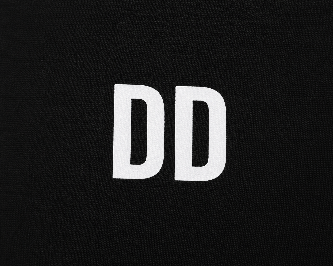 White 'DD' letters on a black background